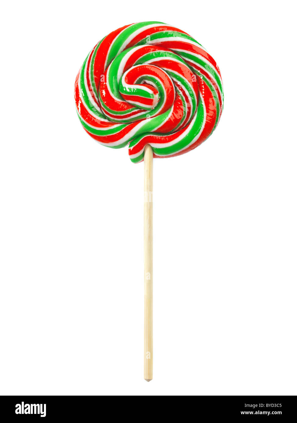 Lollipop coloreados de rojo y verde en un palo aislado sobre fondo blanco. Foto de stock