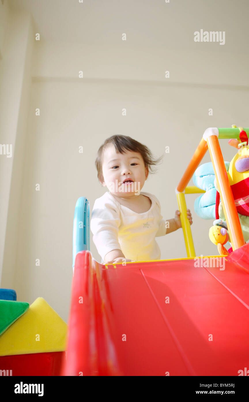 Baby Girl por diapositiva Foto de stock