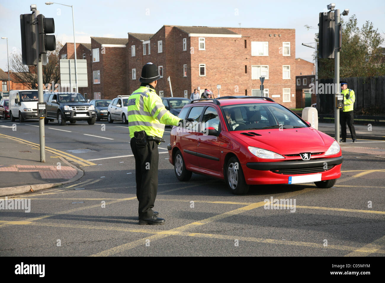 La Policía de Leicestershire cerca y dirigir el tráfico de carretera Foto de stock