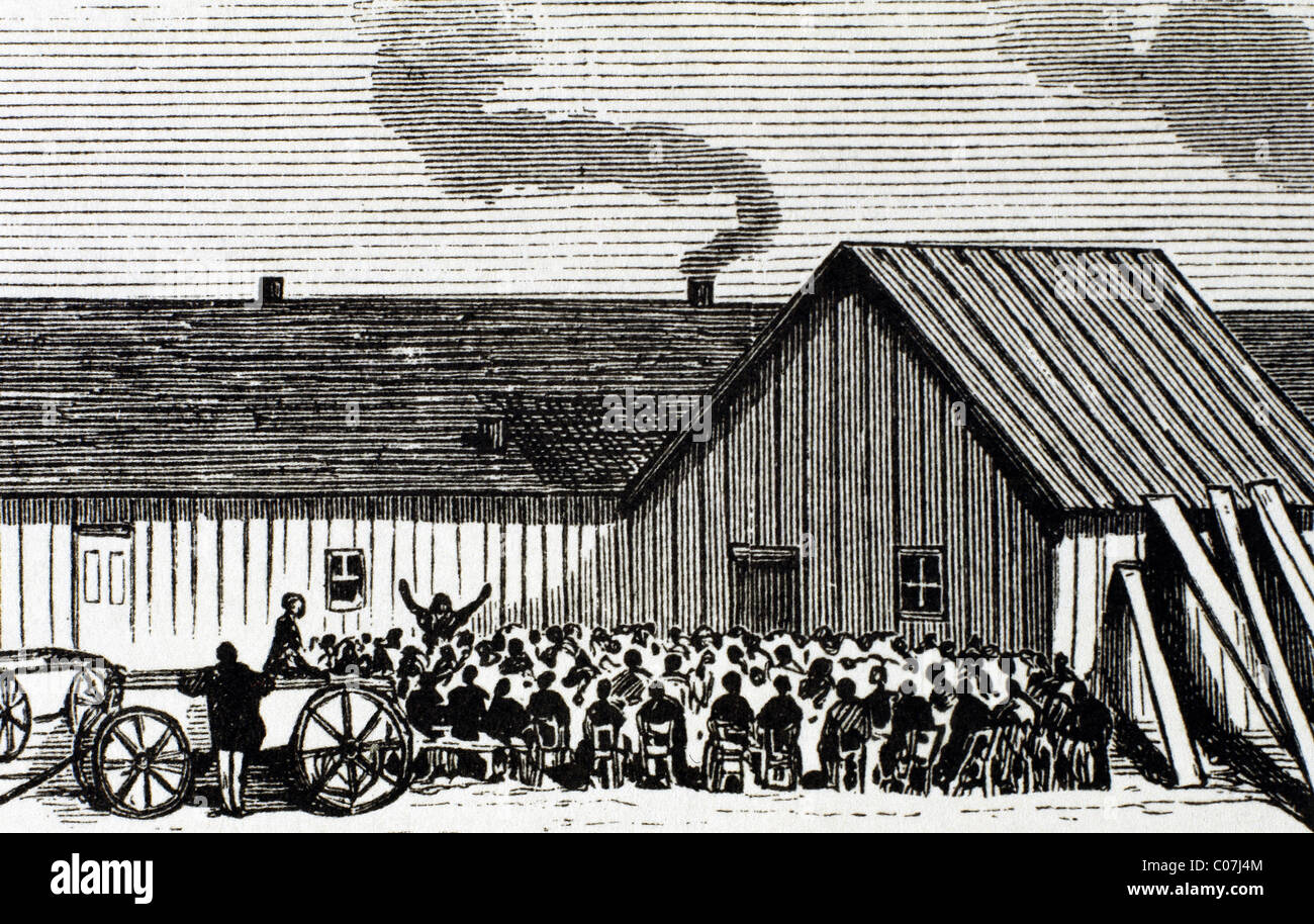 Estados Unidos. Kansas. Servicio religioso menonita fuera de la cabaña. Grabado del periódico "Frank Leslie's' '(1875). Foto de stock
