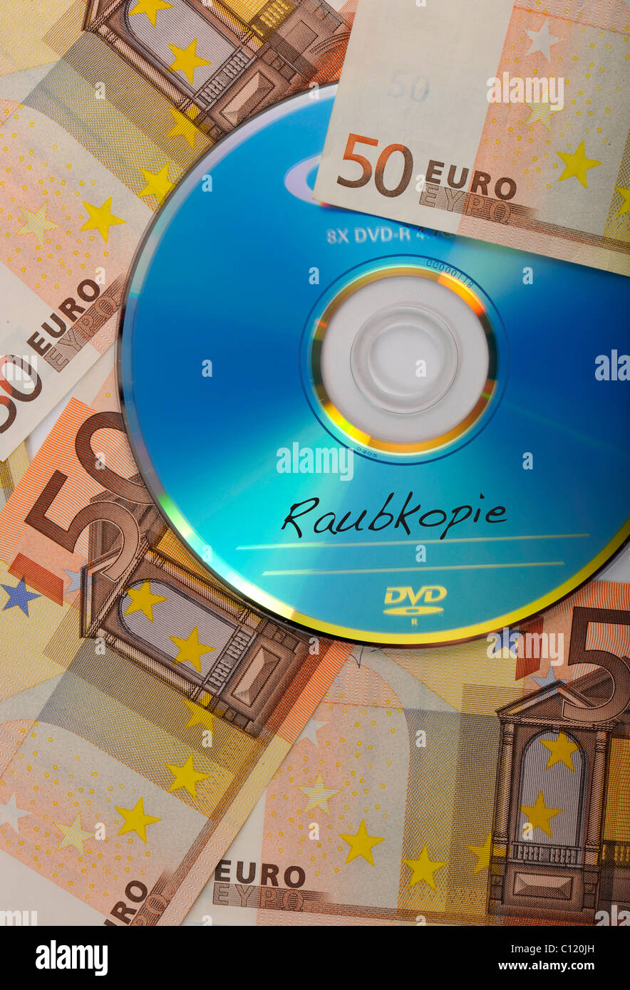 DVD, CD, billetes de euro, imagen simbólica para un concierto, la piratería Foto de stock
