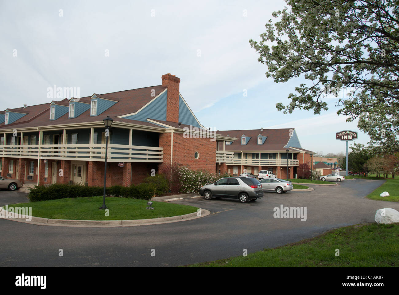 Country Hearth Inn; Alojamiento, Jackson, Michigan, EE.UU. Foto de stock
