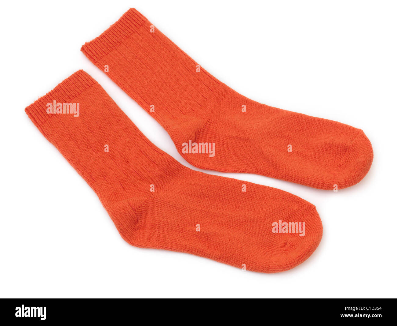 Un par de calcetines para niños naranja Foto de stock