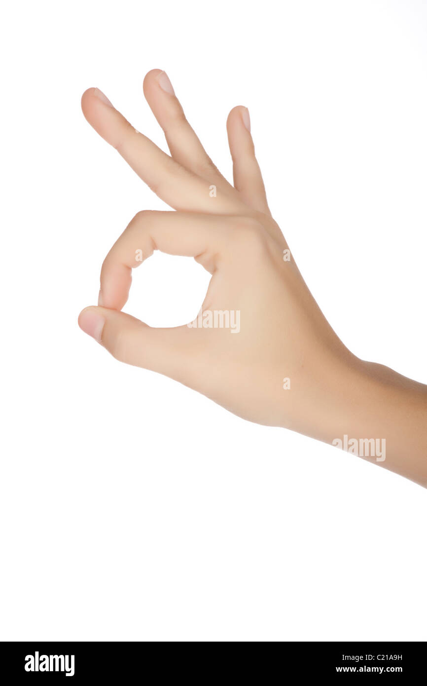 Mujeres caucásicas mediante gestos con las manos para decir ok Foto de stock