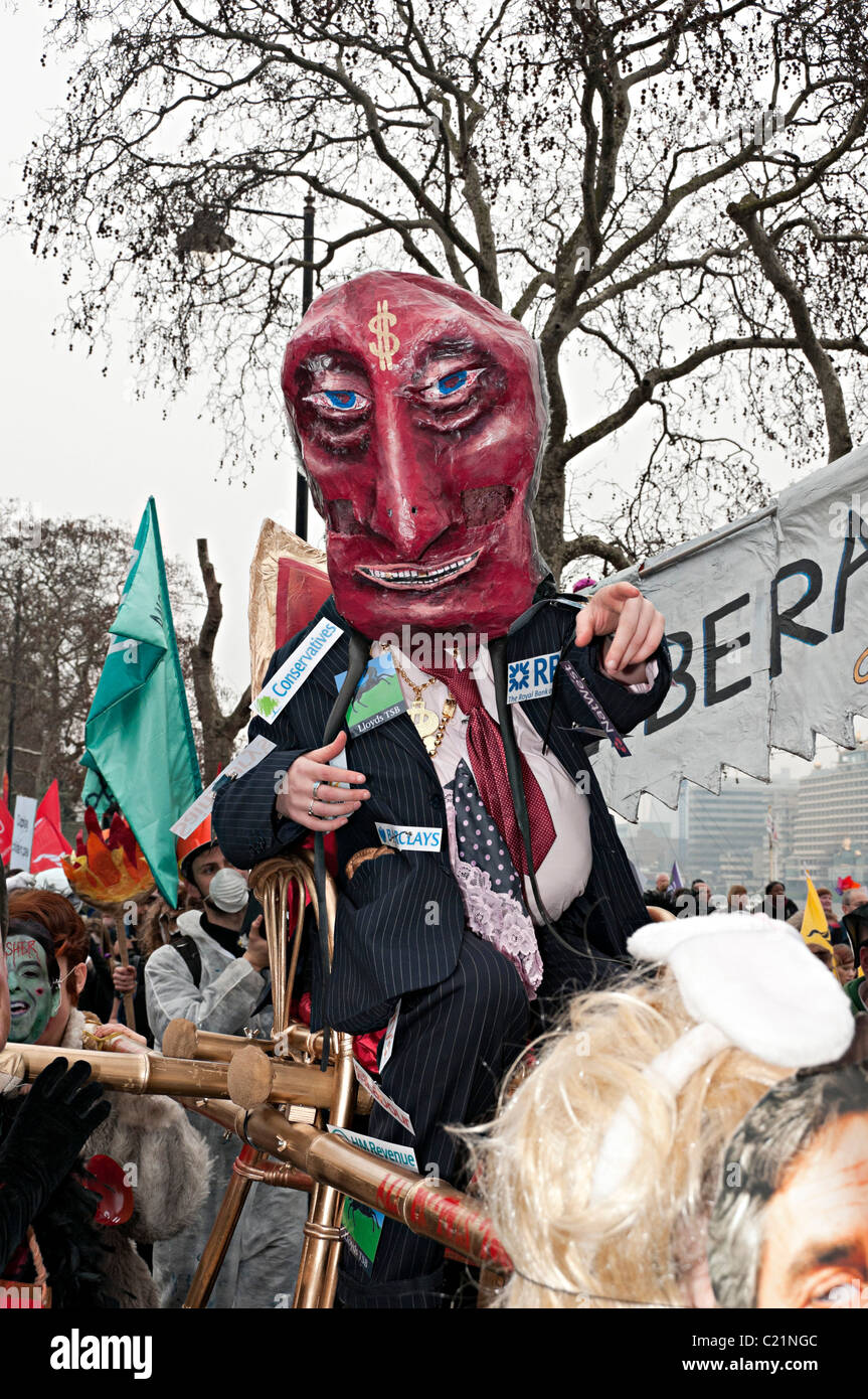 Tuc de marzo para cambiar de Londres el 26 de marzo de 2011 un banquero codicioso Foto de stock