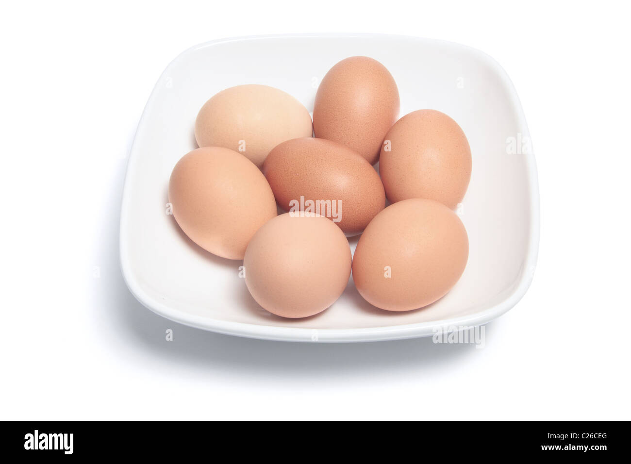 Huevos en plato Foto de stock