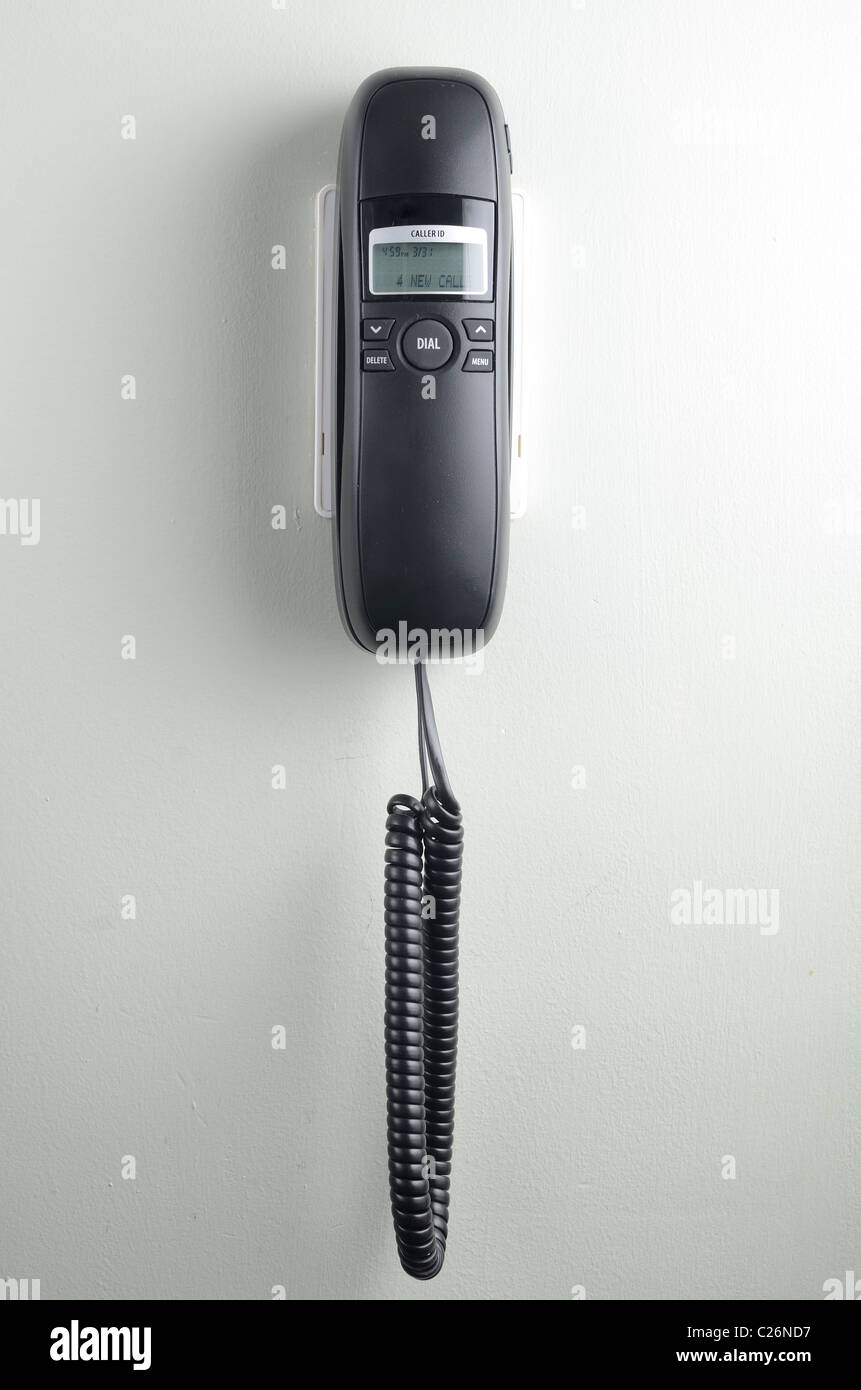 Un teléfono fijo en la pared Fotografía de stock - Alamy