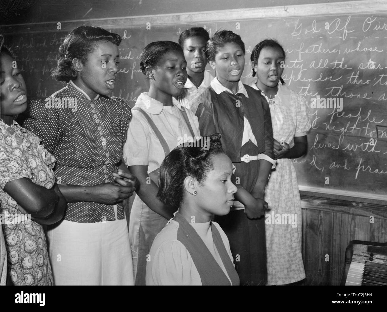 Clases de música afroamericana, en mayo Day-Health practicando canciones para las festividades del Día. Río Flint, Granjas, Georgia Foto de stock