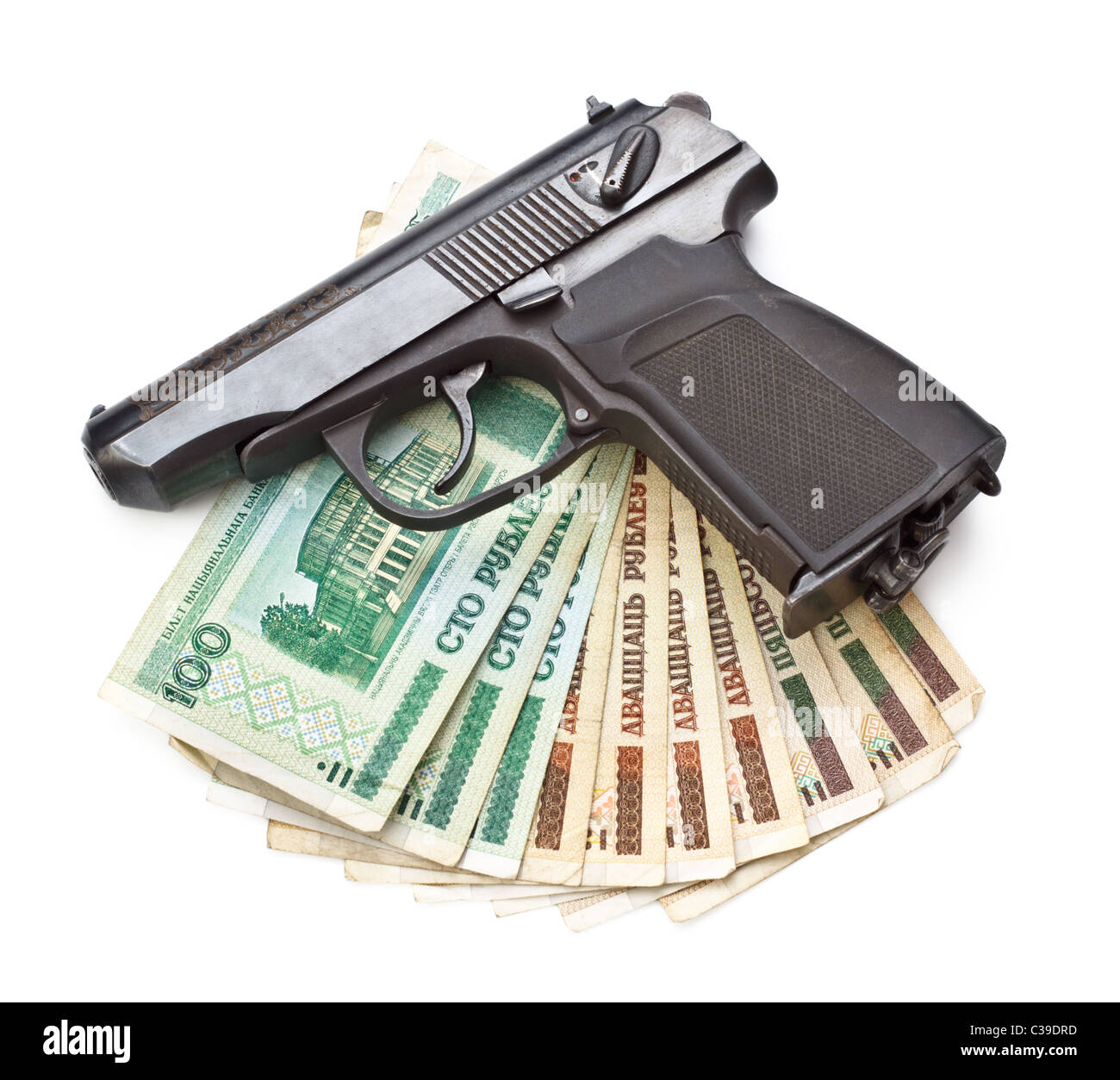 Pistola y dinero aislado sobre fondo blanco. Foto de stock