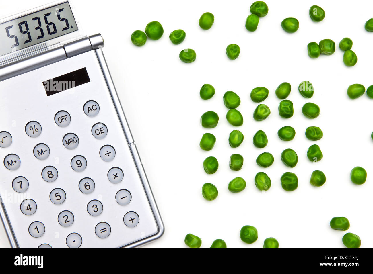 Una calculadora para contar los guisantes Foto de stock