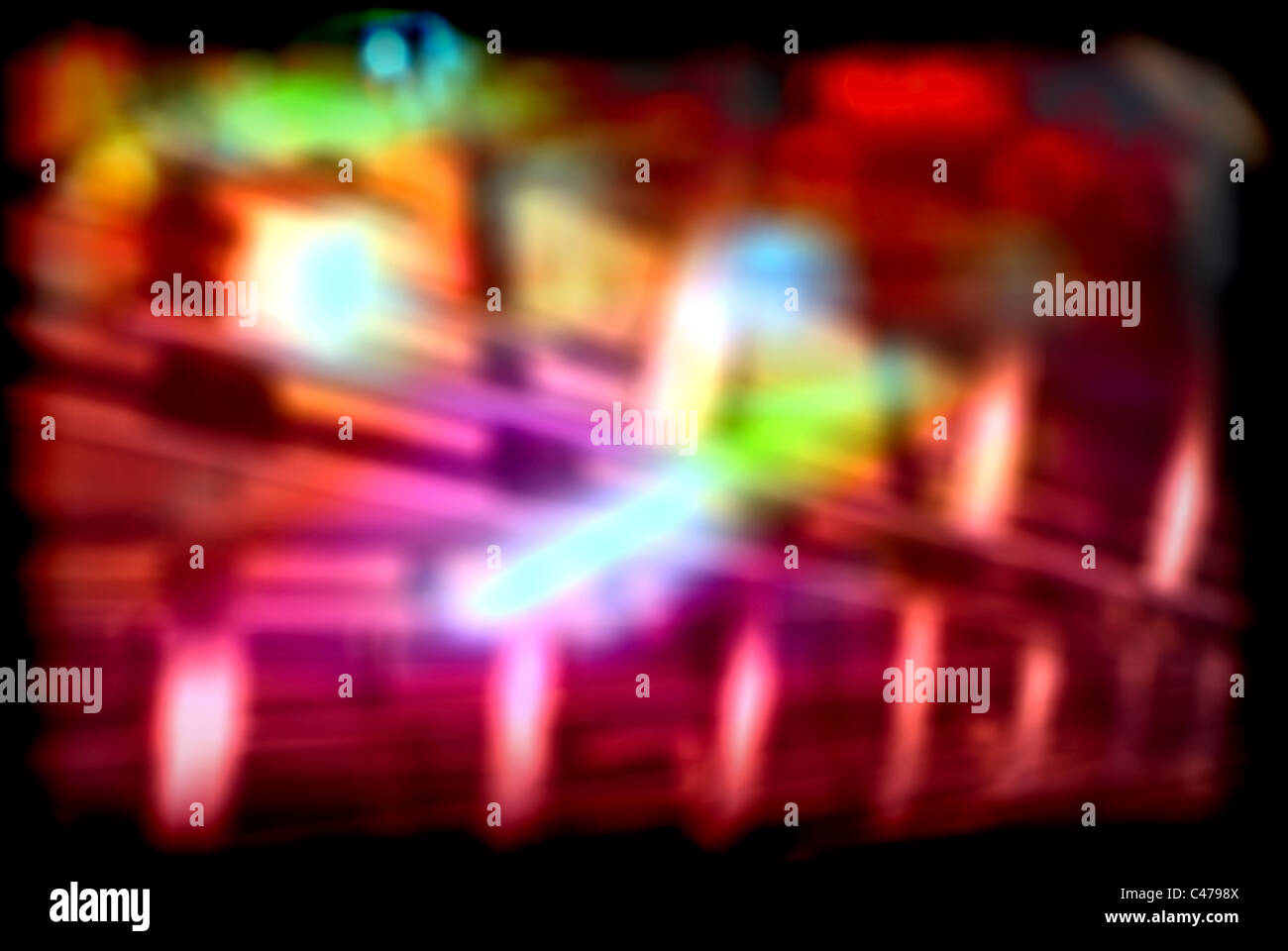 Una imagen de fondo abstracto de multicolores luces borrosa. Foto de stock
