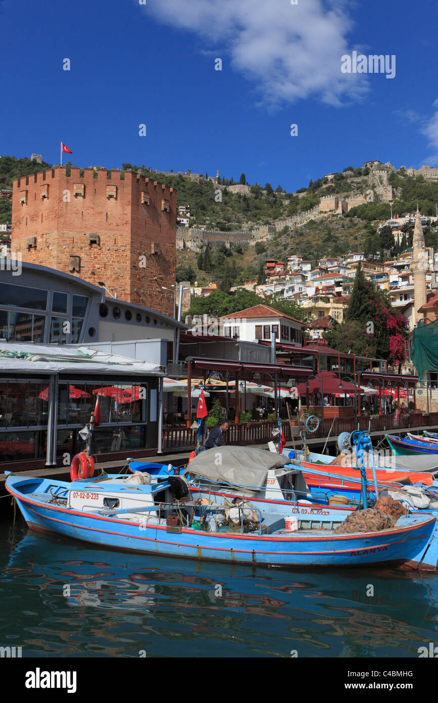 Turquía, Alanya, Torre Roja, fortaleza, puerto, barcos de pesca, Foto de stock
