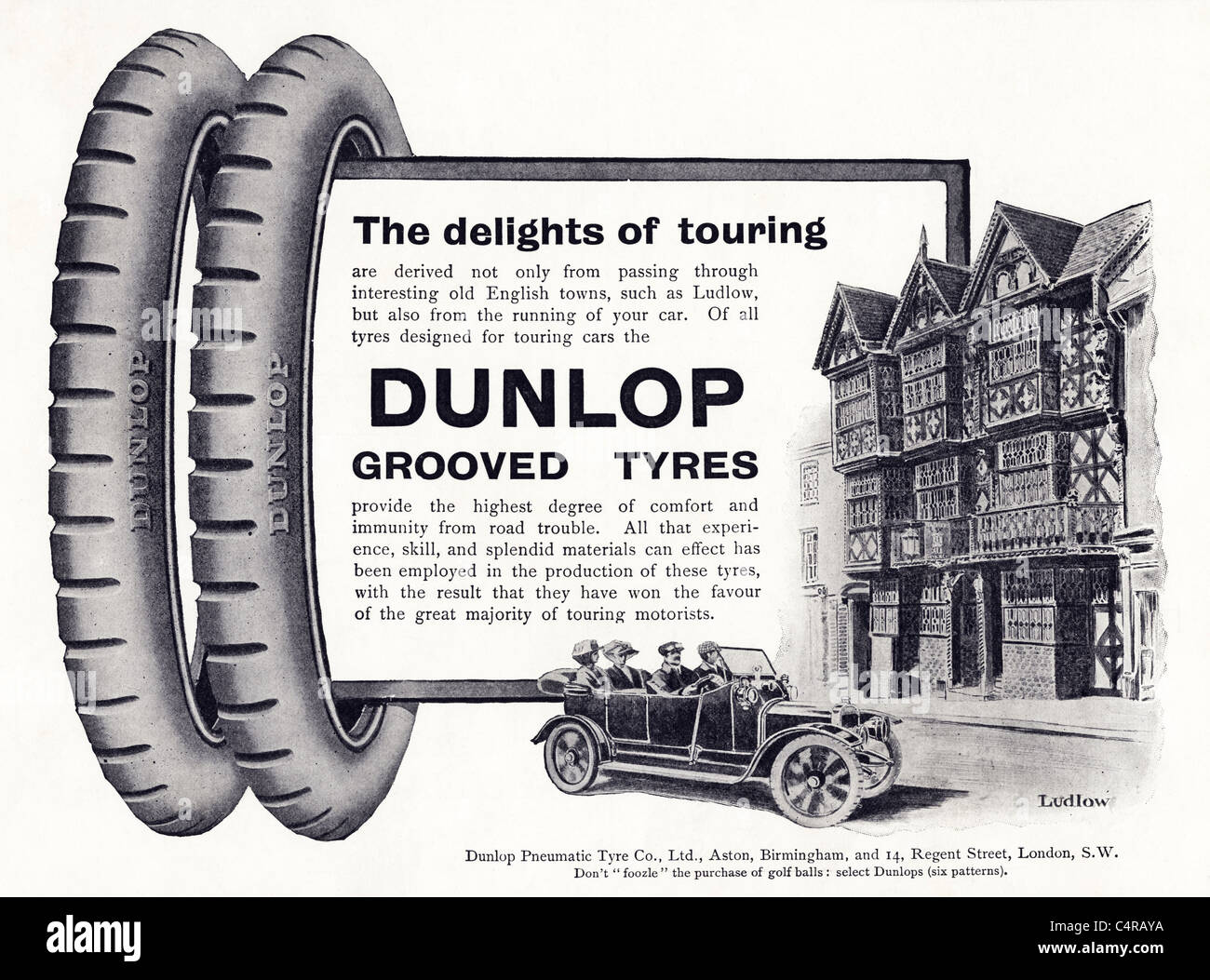 Anuncio histórico del período original en la revista circa 1910 para los neumáticos DUNLOP de coches con el histórico Feathers Hotel en Ludlow Foto de stock