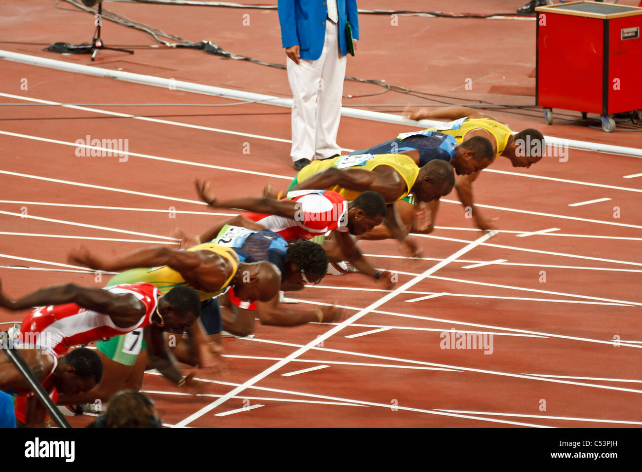 Inicio de los Juegos Olímpicos de mens 100 metros de sprint Foto de stock