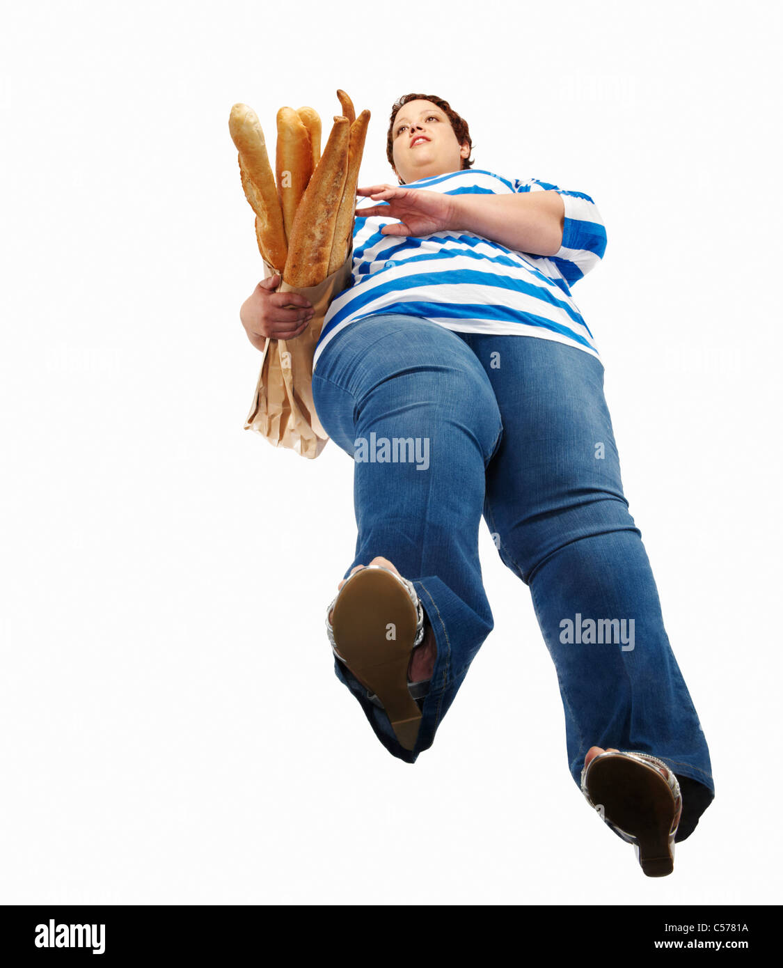 Gran mujer llevando baguettes Foto de stock