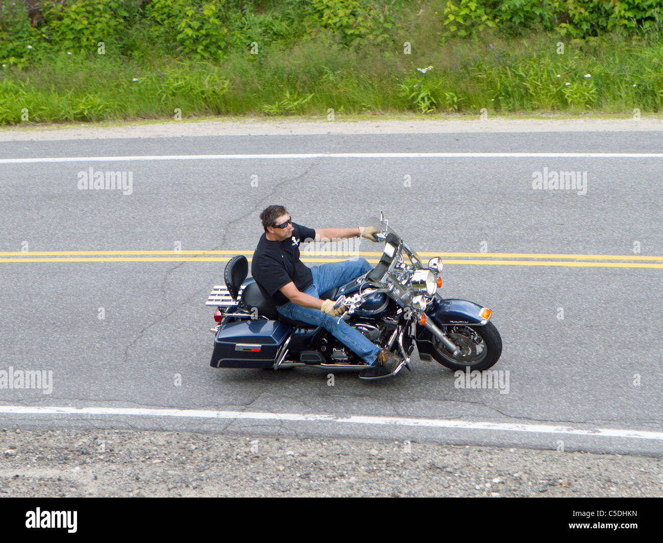 Motorbike rider without helmet fotografías e imágenes de alta