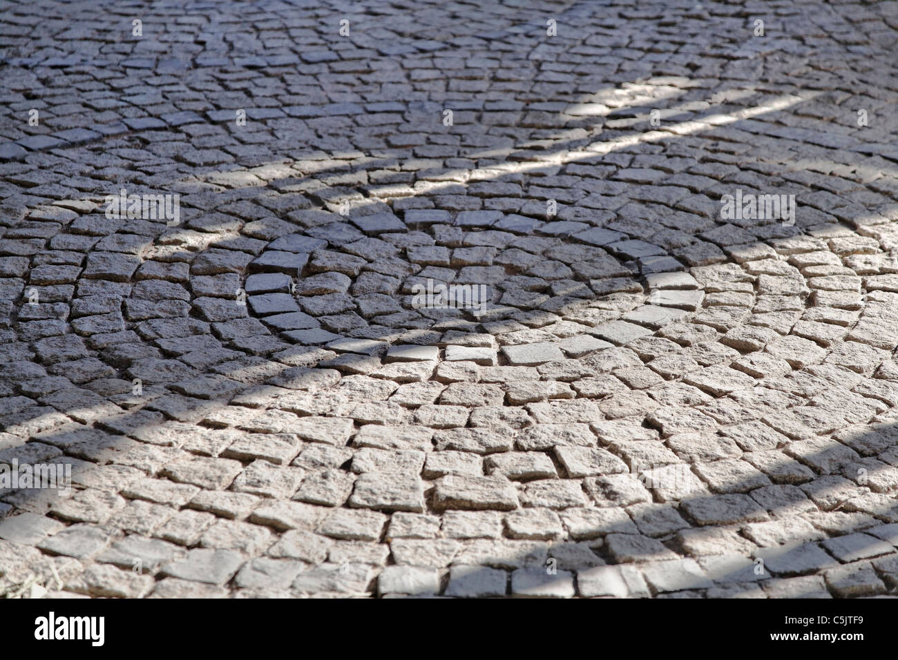 Efecto circular calle adoquinada textura del fondo, horizontal, cultivo, área de copia, Estambul, Turquía Foto de stock