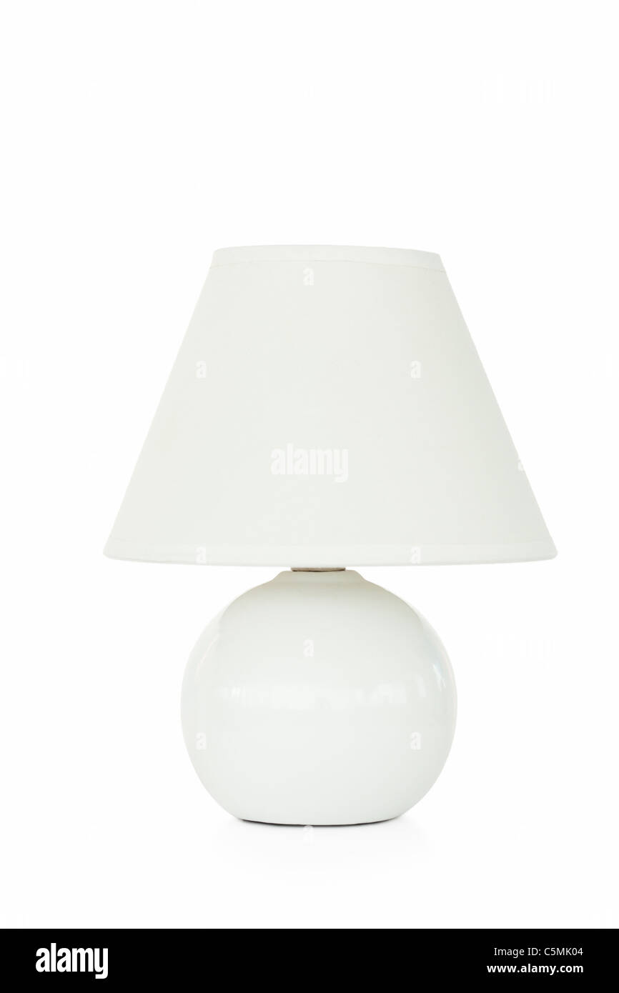 Lámpara blanca sobre un fondo blanco. Foto de stock