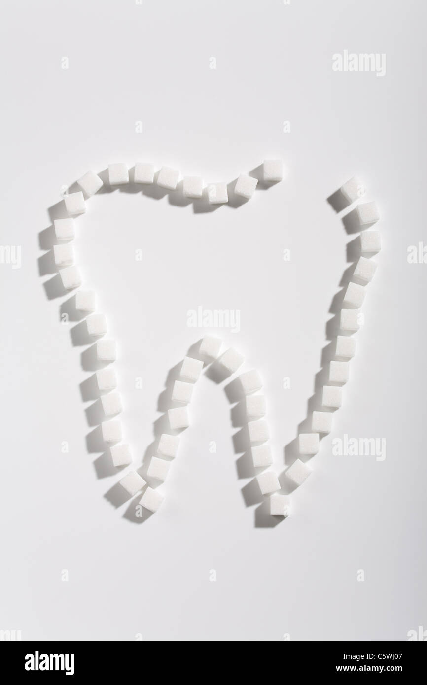 Cubos de azúcar de los dientes, formando una vista elevada Foto de stock