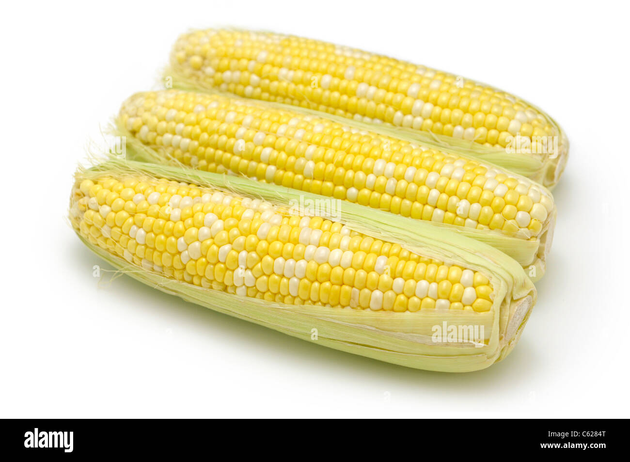 El maíz en la mazorca de maíz / Foto de stock