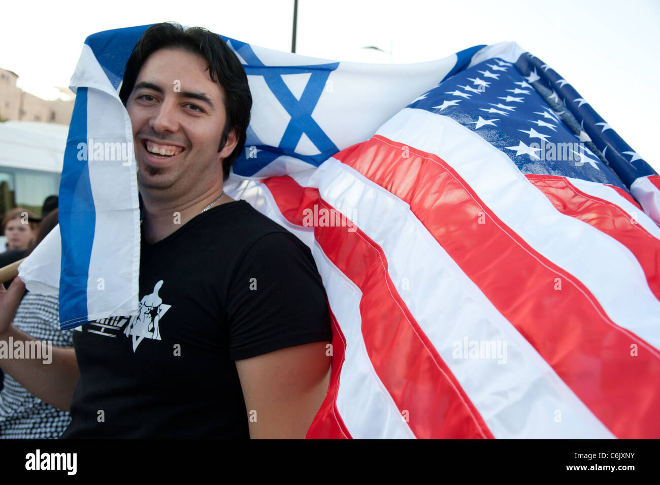 Sionistas ola latina y banderas israelíes en un Glenn Beck rally en Jerusalén. Foto de stock