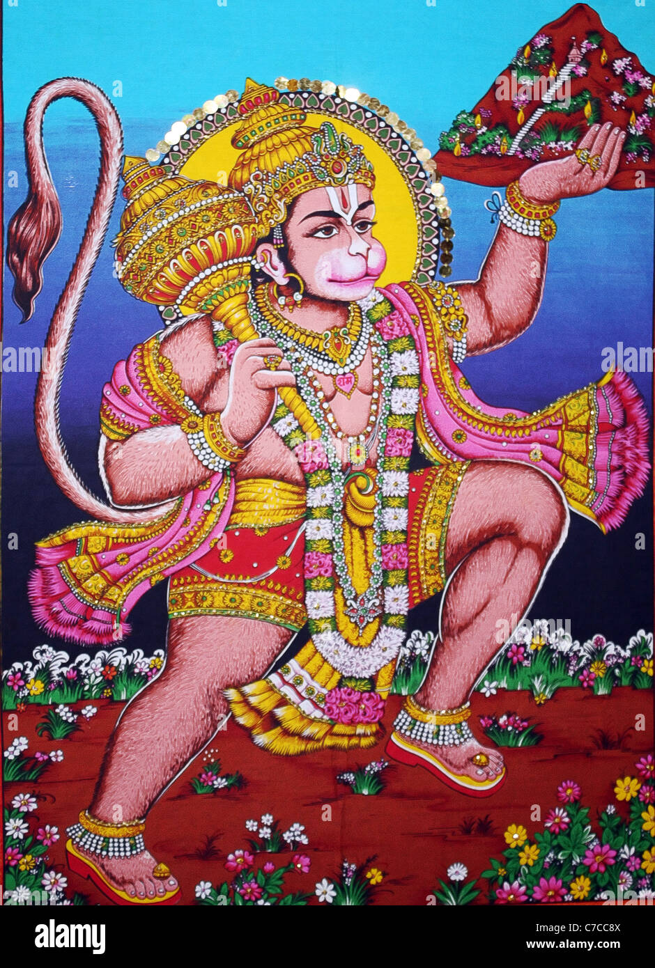 Hanuman, el dios mono en la mitología hindú, una pintura mostrando él levantando la montaña maruthva Foto de stock
