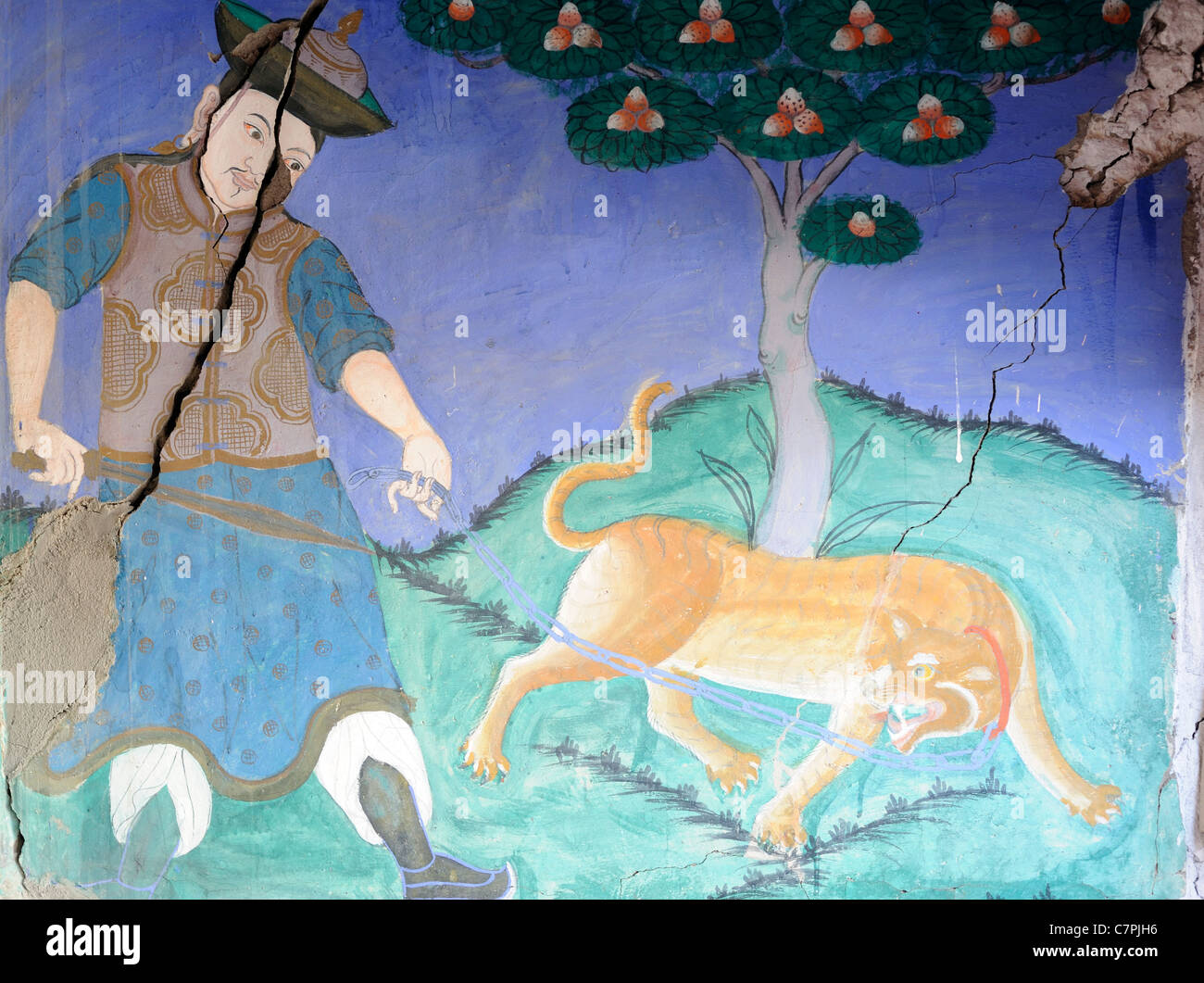 La pintura mural de un mongol con un tigre encadenado simboliza la supremacía de la raza mongola sombrero amarillo budistas sobre el Tibetano Foto de stock