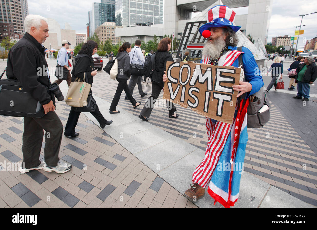 Un demostrador de Boston ocupan las protestas en el centro de Boston, Massachusetts, como inicio de la cabeza de los viajeros. Foto de stock