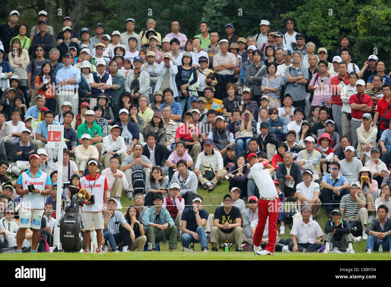 Ryo Ishikawa (JPN) desempeña durante la 13ª verde durante la final del torneo de golf abierto de Canon. Foto de stock