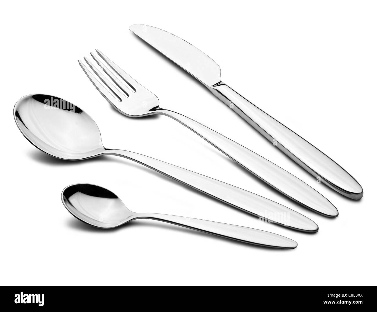 Conjunto de plata con un tenedor, cuchillo, y cucharas Foto de stock
