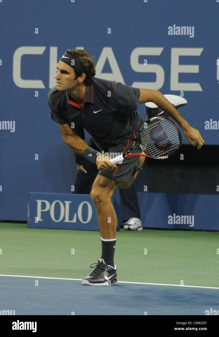 Roger Federer en la asistencia para el US Open de Tenis 2011 Noche inaugural del campeonato, el USTA Billie Jean King National Tennis Center, Foto de stock