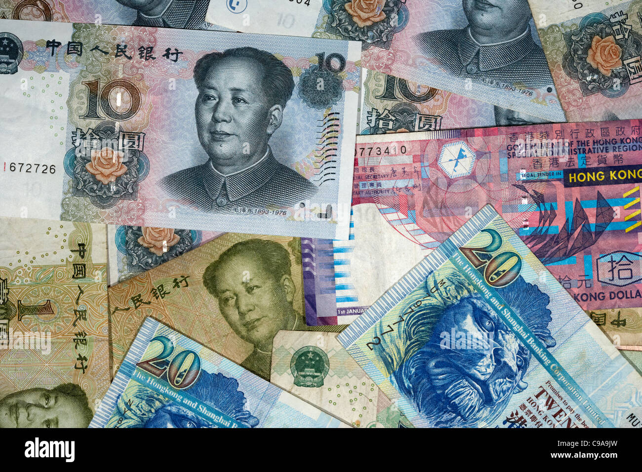 El renminbi chino RMB y billetes de dólar de Hong kong Foto de stock