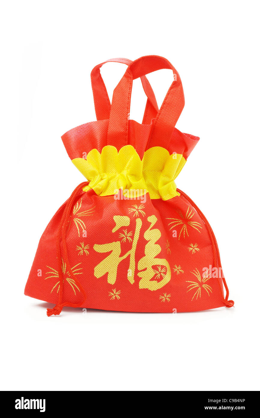 Año nuevo chino prosperidad bolsa de regalo sobre fondo blanco. Foto de stock