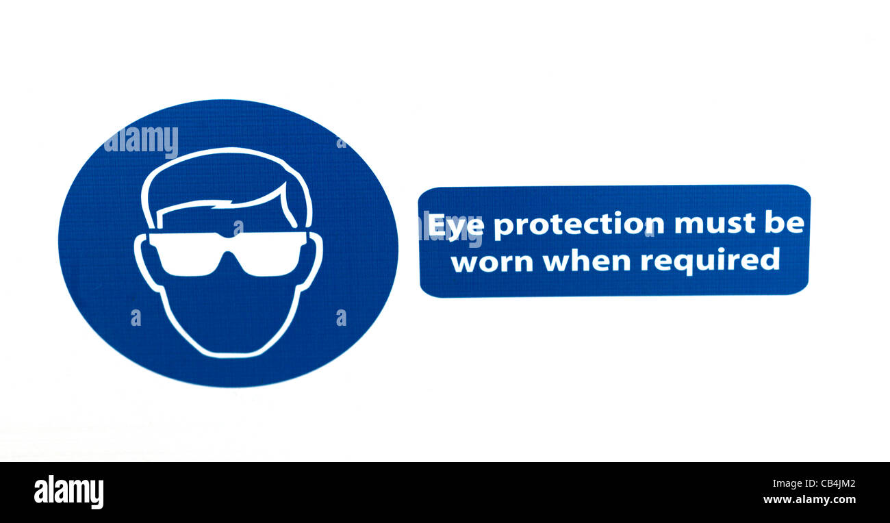Señal de seguridad en un sitio de Construcción Protección ocular deben ser usados cuando sea necesario. Foto de stock