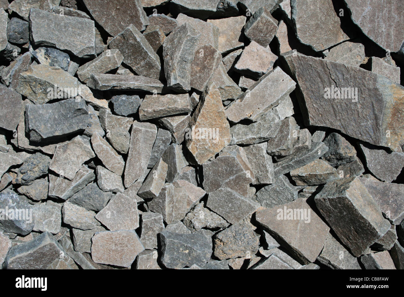 Angular roca andesita gris roto antecedentes Foto de stock