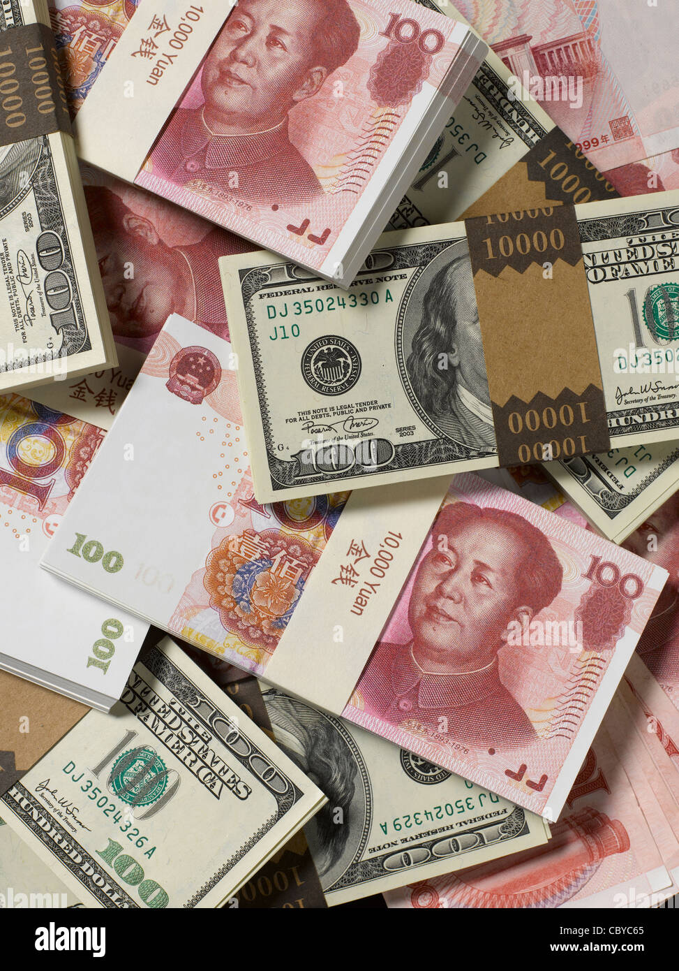 Yuan chino y moneda US Foto de stock