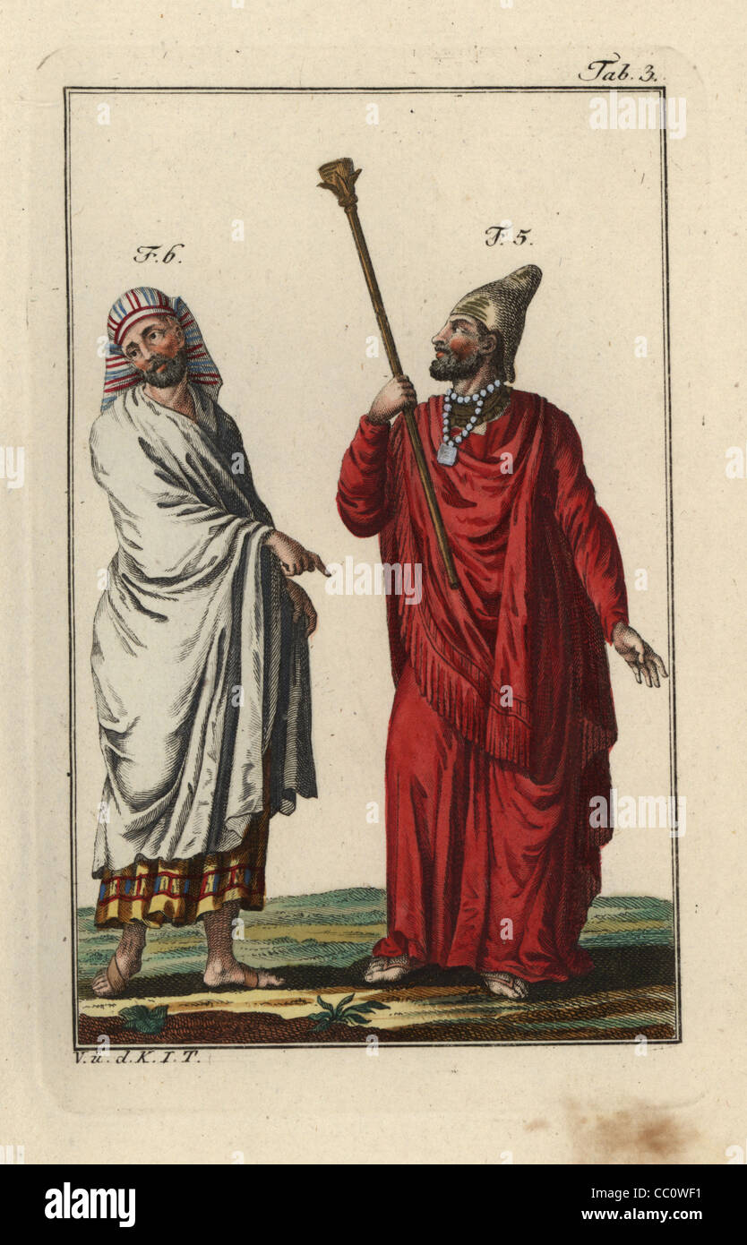 Un rey egipcio o faraón egipcio y un hombre en traje de etiqueta. Foto de stock