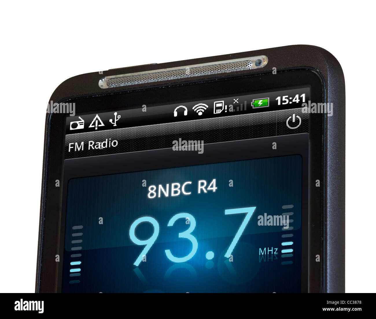 Escuchando la FM Radion en un smartphone HTC Foto de stock