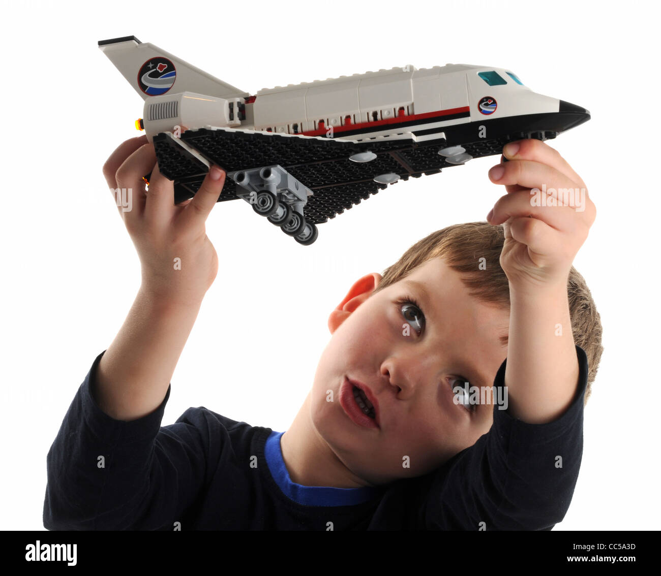 Lego, niño jugando con lego space shuttle Foto de stock