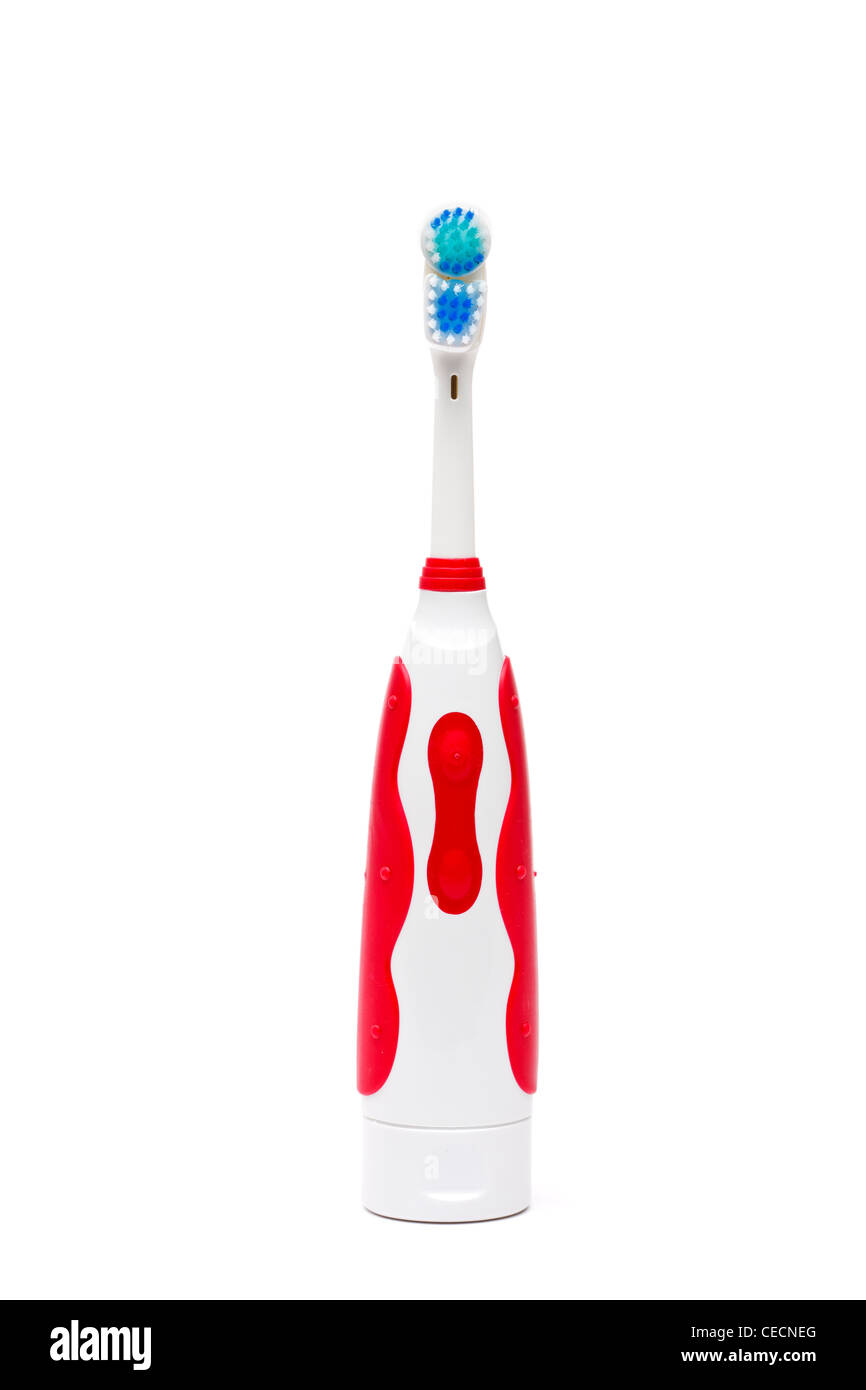 Cepillo dental eléctrico sobre fondo blanco. Foto de stock
