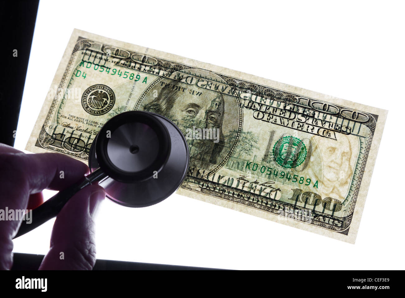 Estetoscopio y dólar, concepto de Salud financiera Foto de stock