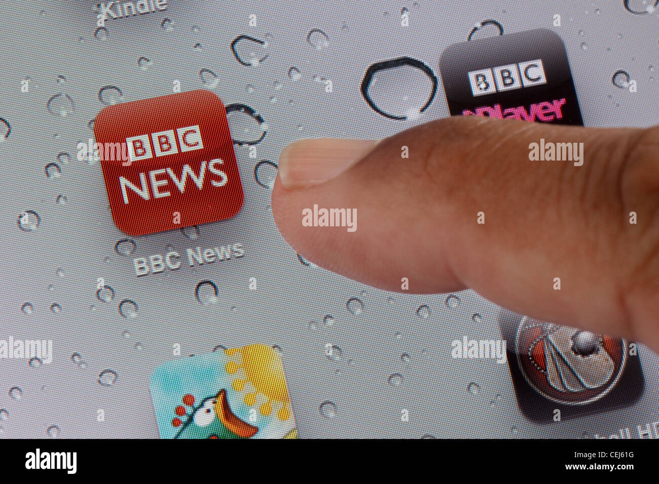 Cerca del icono de la BBC News en un iPad app Foto de stock