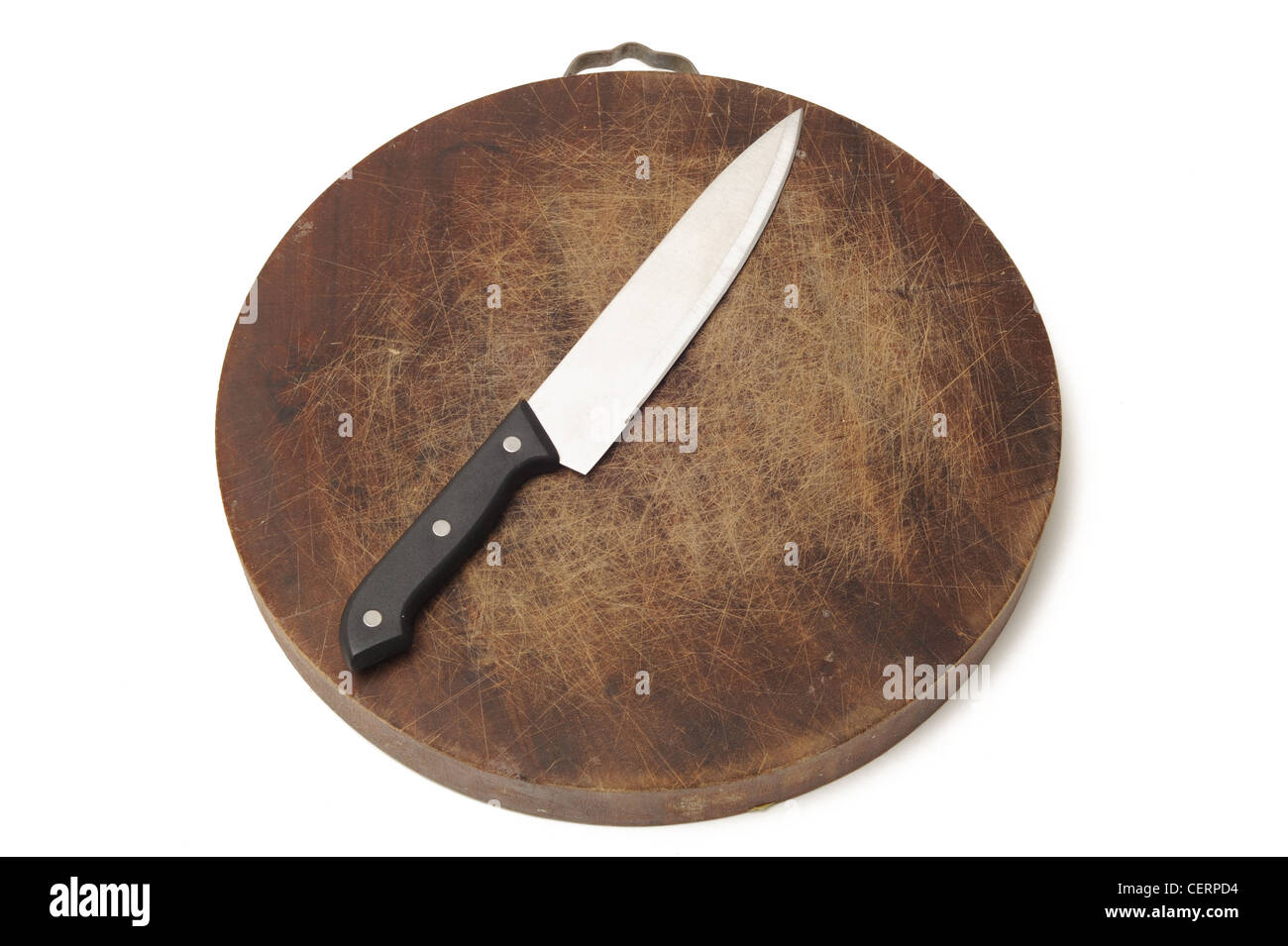 Cuchillo de cocina sobre una tabla de cortar de madera Foto de stock