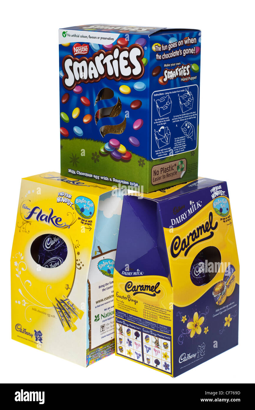 Tres Huevos de Pascua de chocolate en caja de Nestlé y Cadbury's Foto de stock