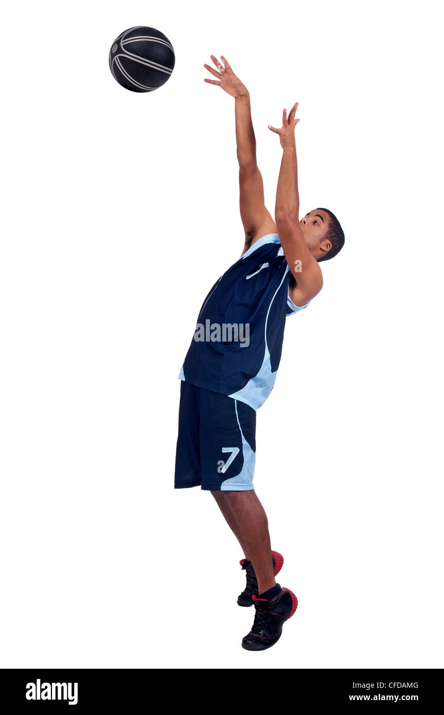 El jugador de baloncesto aislado en blanco Foto de stock