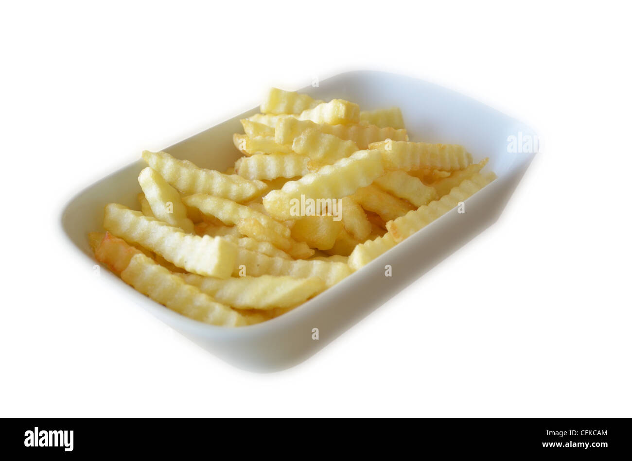 Papas fritas en blanco , la placa de fondo blanco. Foto de stock