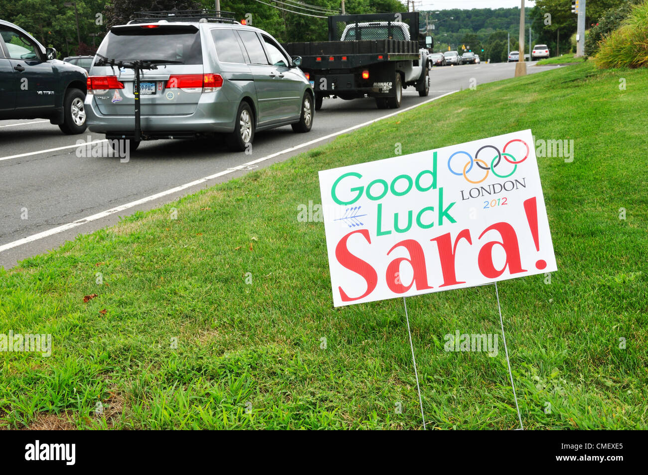 Asistencia en carretera póster para Connecticut remero Sara Hendershot que calificaron para la final en las Olimpiadas de Verano. Avon, Connecticut, EE.UU. Foto de stock
