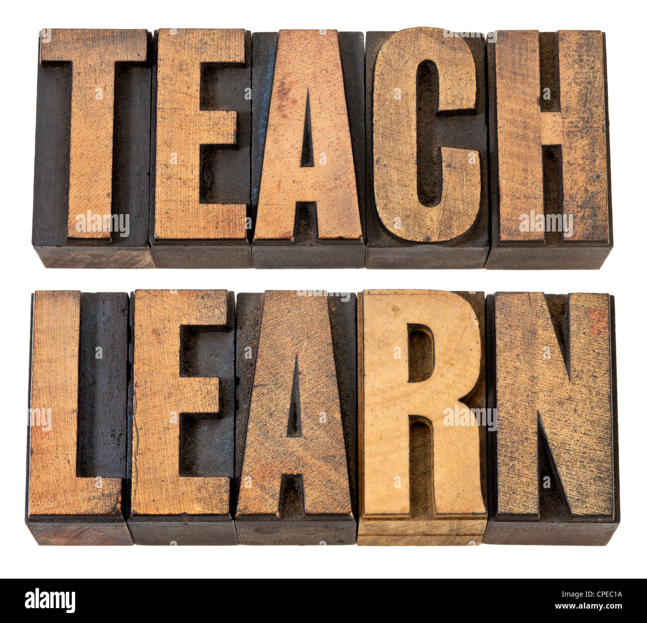 Enseñar y aprender - educación concepto - palabras aisladas en vintage tipografía tipo de madera Foto de stock