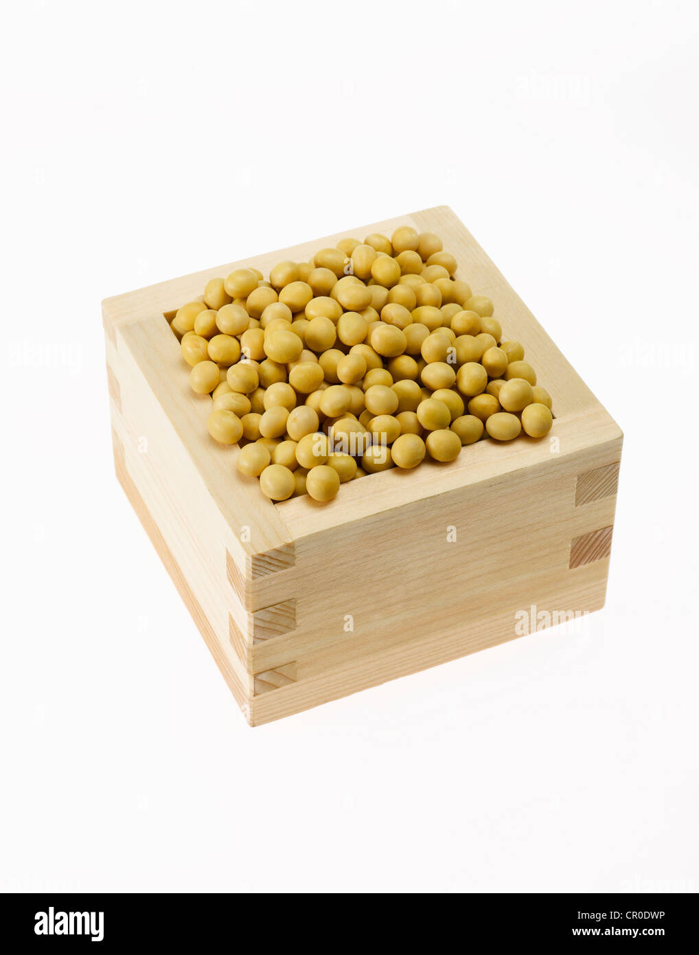 Habas de soja amarilla en caja cuadrada Foto de stock