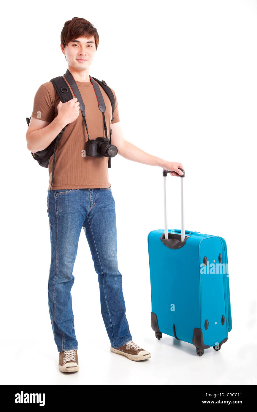 La longitud total del joven viajero con maleta Fotografía de stock - Alamy
